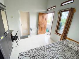 Kost Kosan Ibu Evi Damkar