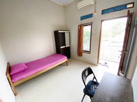 Kost Kosan Ibu Evi Damkar